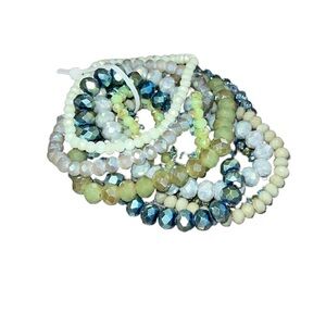 BRACELET set of 9. Stackable and stretchy. Shades of green. NWT